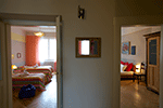 Hallway with entrances to both bedrooms