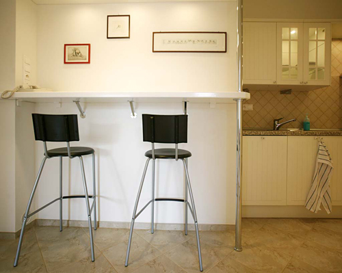 
Breafkast bar in Obecni Dvur apartment offered by Apartments in Prague. Prague Hotel apartment accommodation is offered  by accommodation in Prague and apartments in Prague. This short-term apartment rental Accomodations is close to Prague’s Charles Bridge and Malostranske Namesti is in Mala Strana and is offered by apartments in Prague