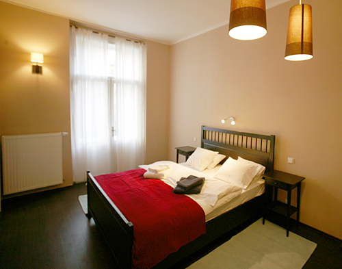 
Master Bedroom in Spanelska 2 apartment accommodation.  Prague Hotel apartment accomodation lodging is offered  by accommodation in Prague and apartments in Prague. This short-term apartment rental Accomodation is close to Prague’s Wenceslas Square and Muzeum and is in Stare Mesto and is offered by apartments in Prague