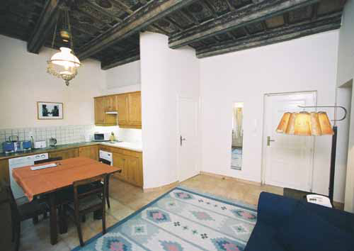 Living room and kitchen of Vlasska 1, an apartment in Prague. Accommodation in Prague offered by Prague Accommodations, apartments in Prague.