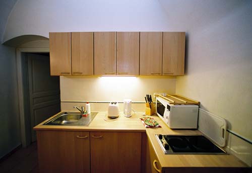 Kitchen of Vlasska 2. Vlasska 2, an apartment offered by Prague Accommodations, is close to Prague Castle and the Lesser Town Square.
