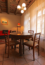 Dining table with sofa and floor lamp