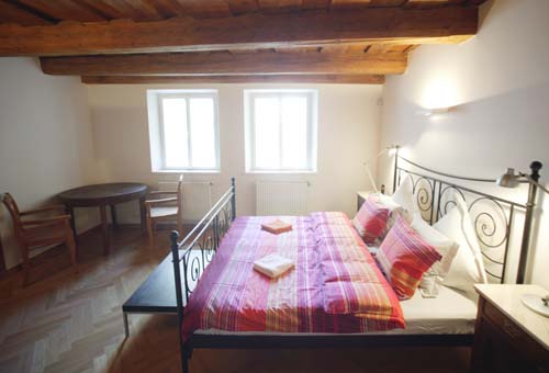 
Master bedroom in Residence Janska, appartment 4 an apparatment in Prague. Apartment 4 is offered by Prague Accommodation and Apartments in Prague, is close to Prague’s Charles Bridge and Malostranske Namesti being in Mala Strana, heart of Prague