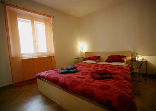 
Master bedroom in appartament 6 in Janska 7. Prague Hotel apartment accommodation offered  by accommodations in Prague. This short-term apartment rental Accomodation is close to Prague’s Charles Bridge and Malostranske Namesti is in Mala Strana near Nerudova Street and the US Embassy and Petrin Hill