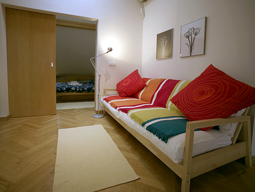 
The living room and couch in Janska 9 apartment hotel accommodation lodging.  Prague Hotel apartment accommodation is offered  by accommodation in Prague and apartments in Prague. This short-term apartment hotel rental Accomodation is close to Prague’s Lesser Town Square and is in mala strana and is offered by apartments in Prague